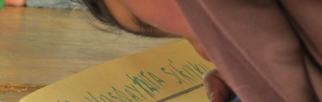 Quechua girl writes